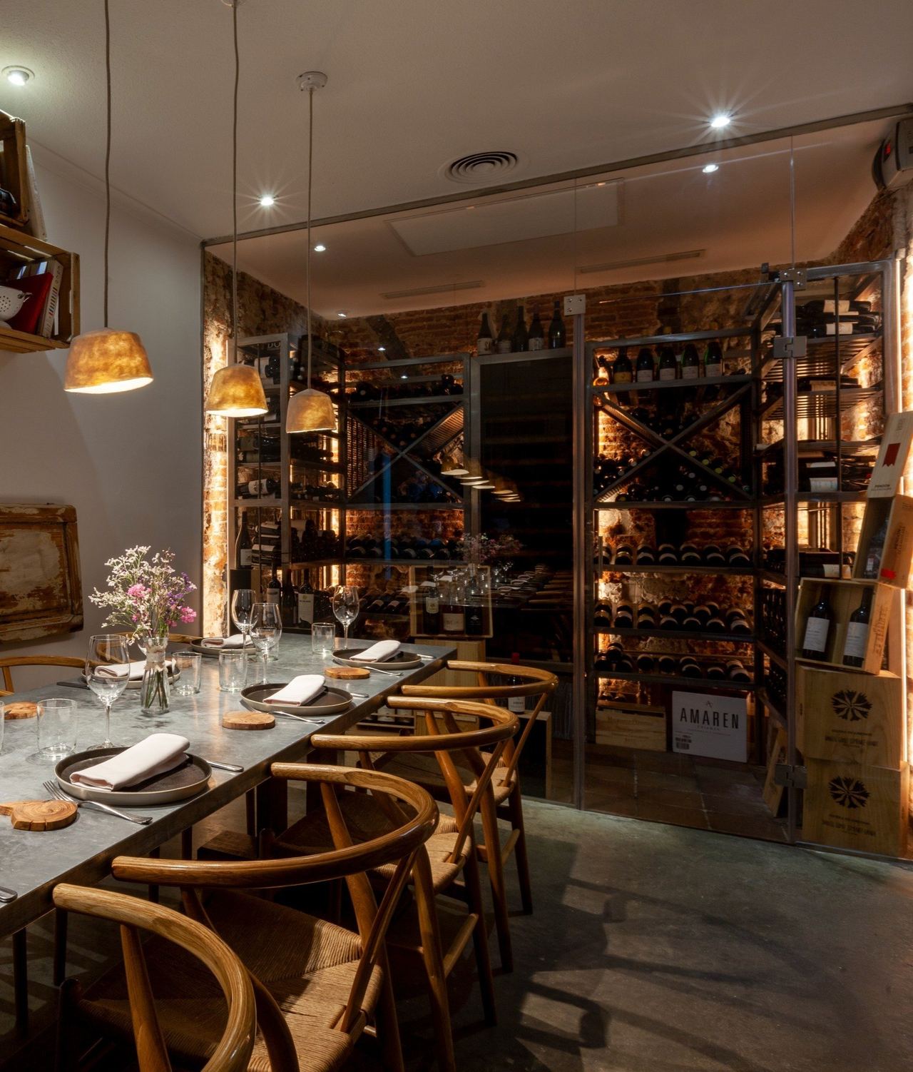The dining room at Triciclo, beside the wine racks