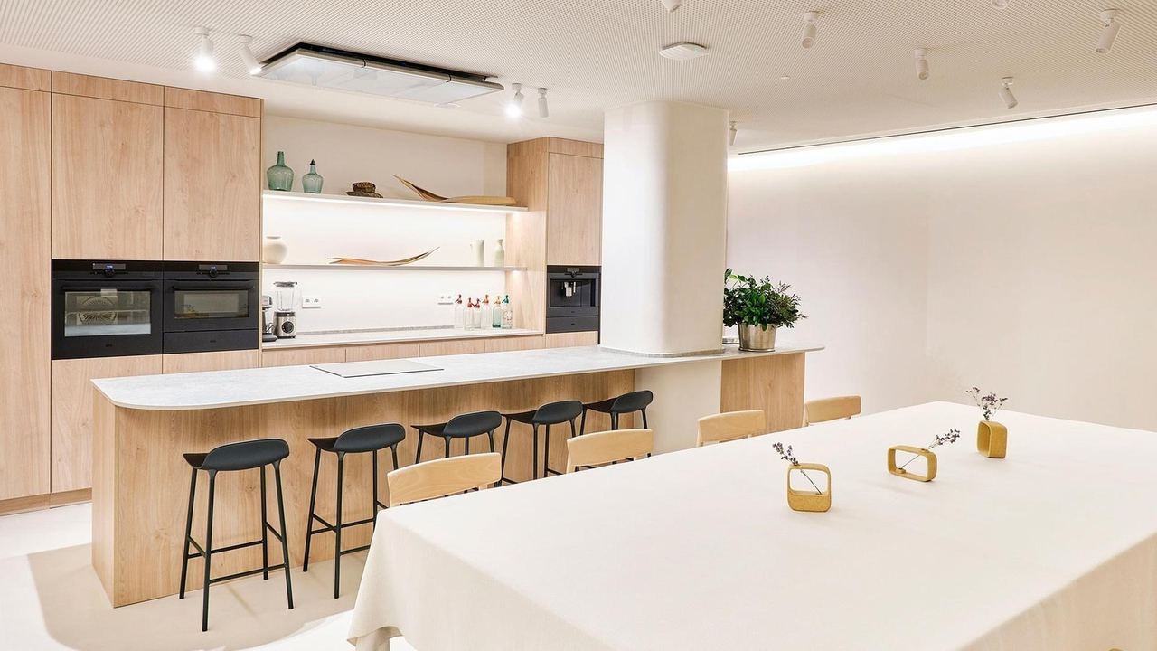 The kitchen table at VelascoAbellà, with stools along the counter
